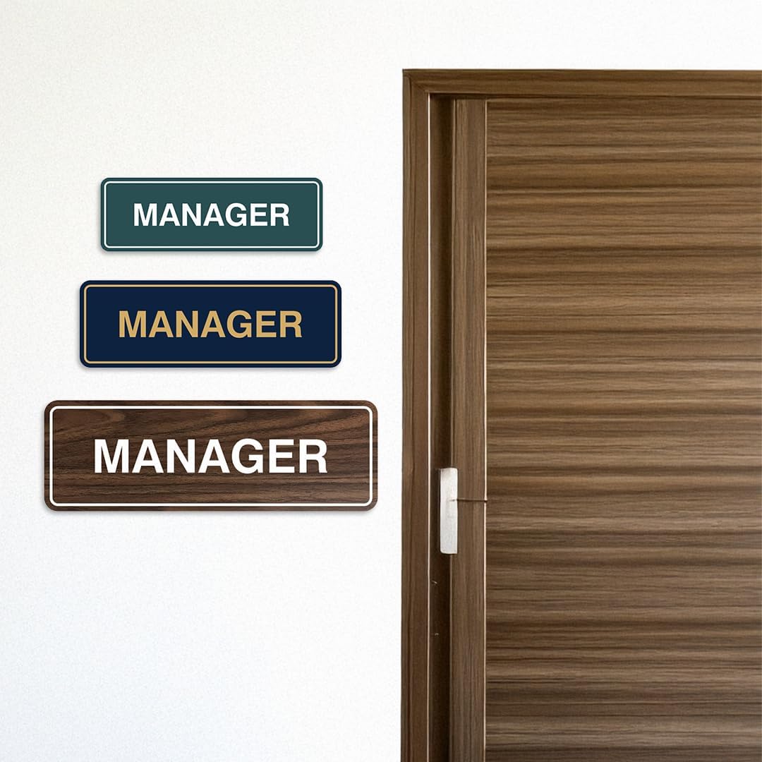All Quality manager door sign close up of laser engraved text