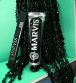 Close up of Marvis vintage style black tube with sculpted cap for elegant bathroom decor