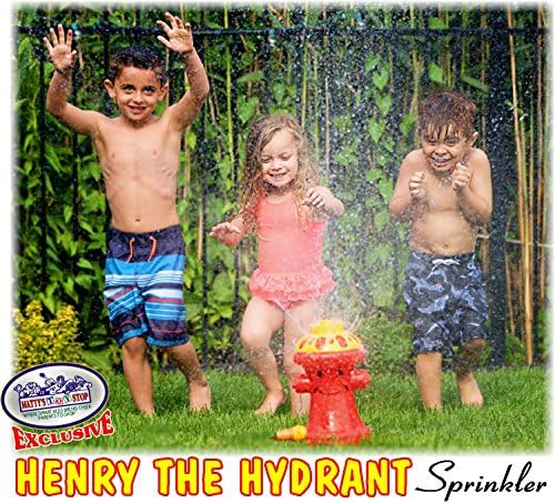 Spinning fire hydrant water sprinkler spraying water in a backyard setting