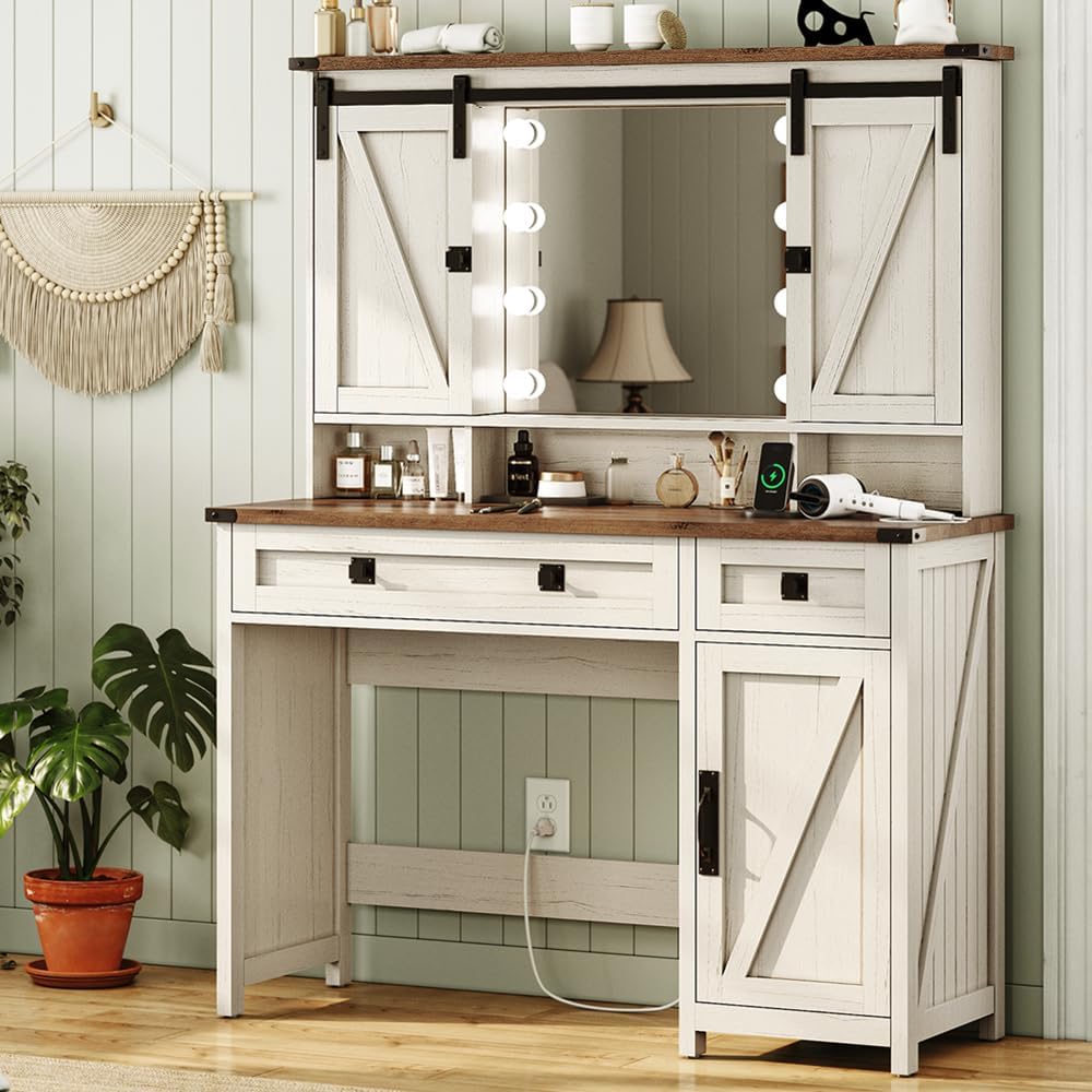 AOGLLATI Makeup Vanity front view showcasing white farmhouse finish and sliding barn doors over the illuminated mirror.