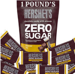 Individually wrapped zero sugar milk chocolate, dark chocolate, and caramel candies displayed together.