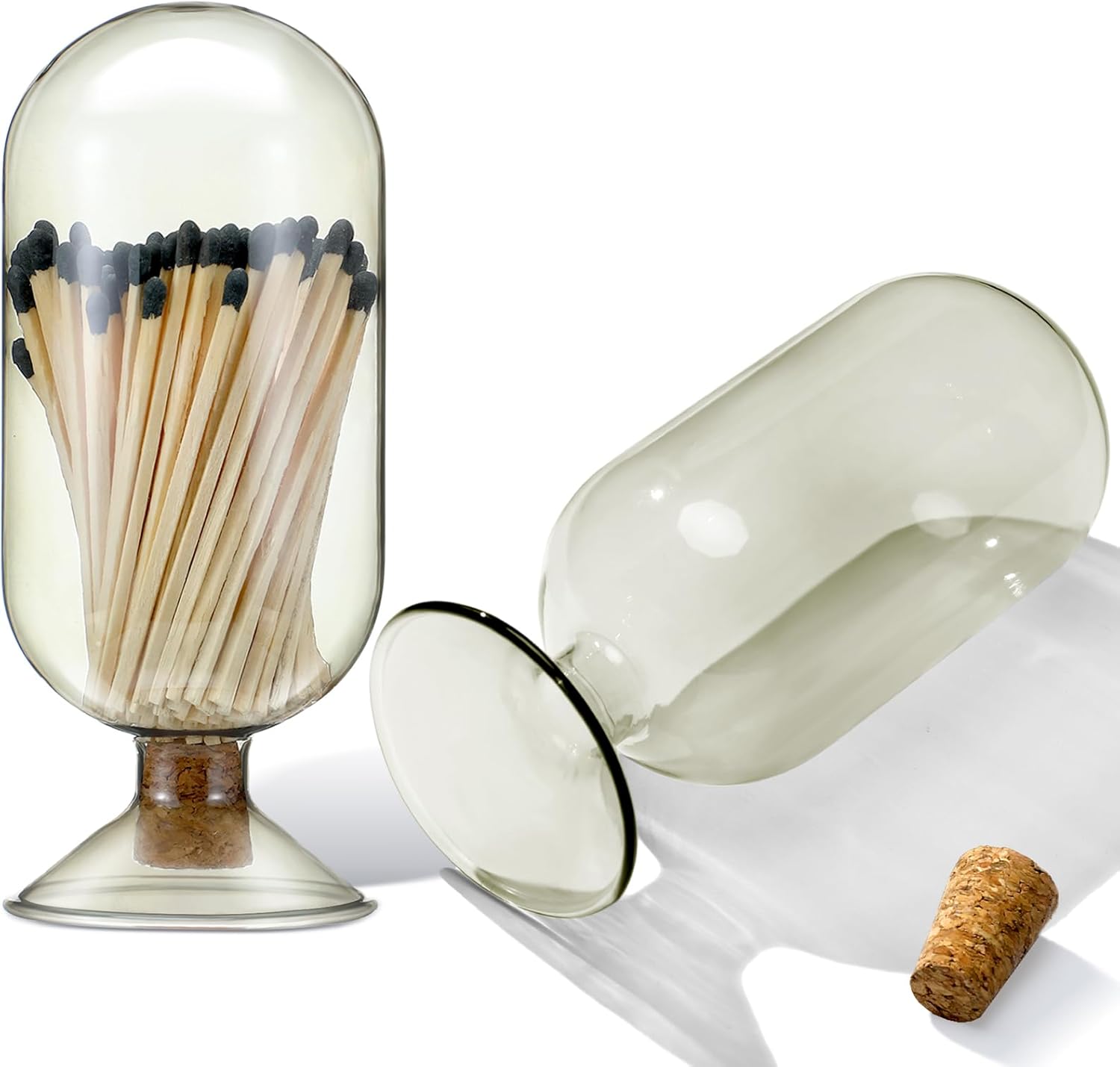 Teenyyou smoke grey glass match cloche holder front view on a fireplace mantle