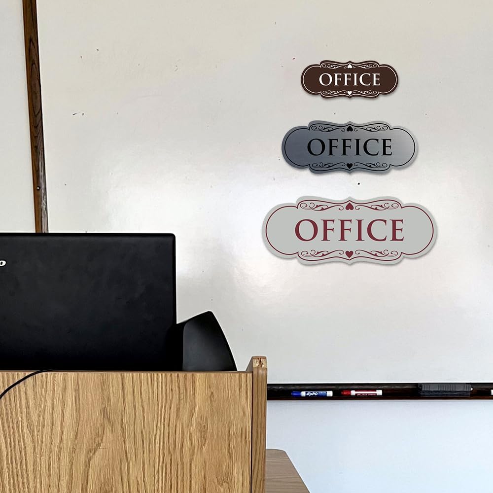All Quality office sign displayed on a glass window