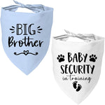 Lifestyle image of a cat and dog wearing matching baby security bandanas.