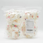 Gluten free imported candy assortment highlighting the bulk one pound packaging of Donty-Tonty jujube nougat.