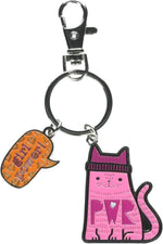 Wit Gifts enamel keychain held in hand for scale