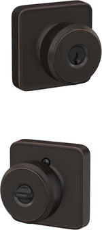 Schlage Bowery dummy door knob front view in aged bronze