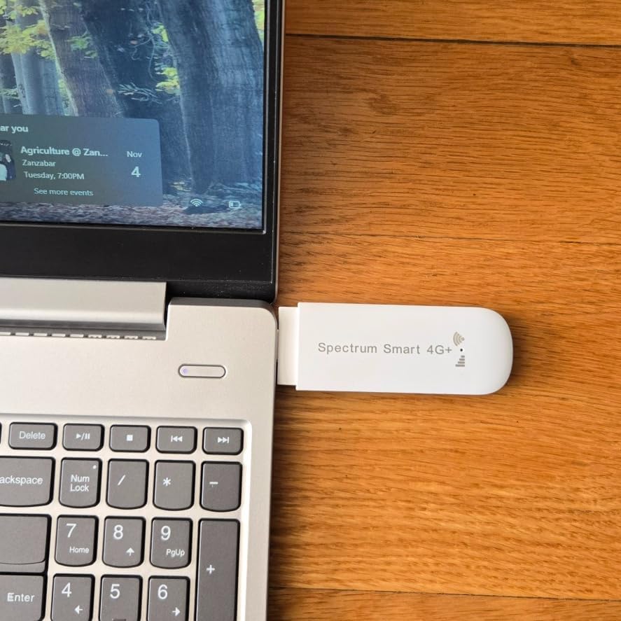 Side profile of Spectrum Smart portable 4G LTE modem showing USB connector