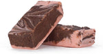 Small batch creamy dessert bars sliced on a rustic wooden serving board