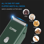 Waterproof electric pet trimmer being washed under running tap water