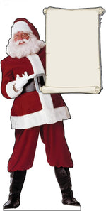 People posing with giant candy cane Christmas cutout