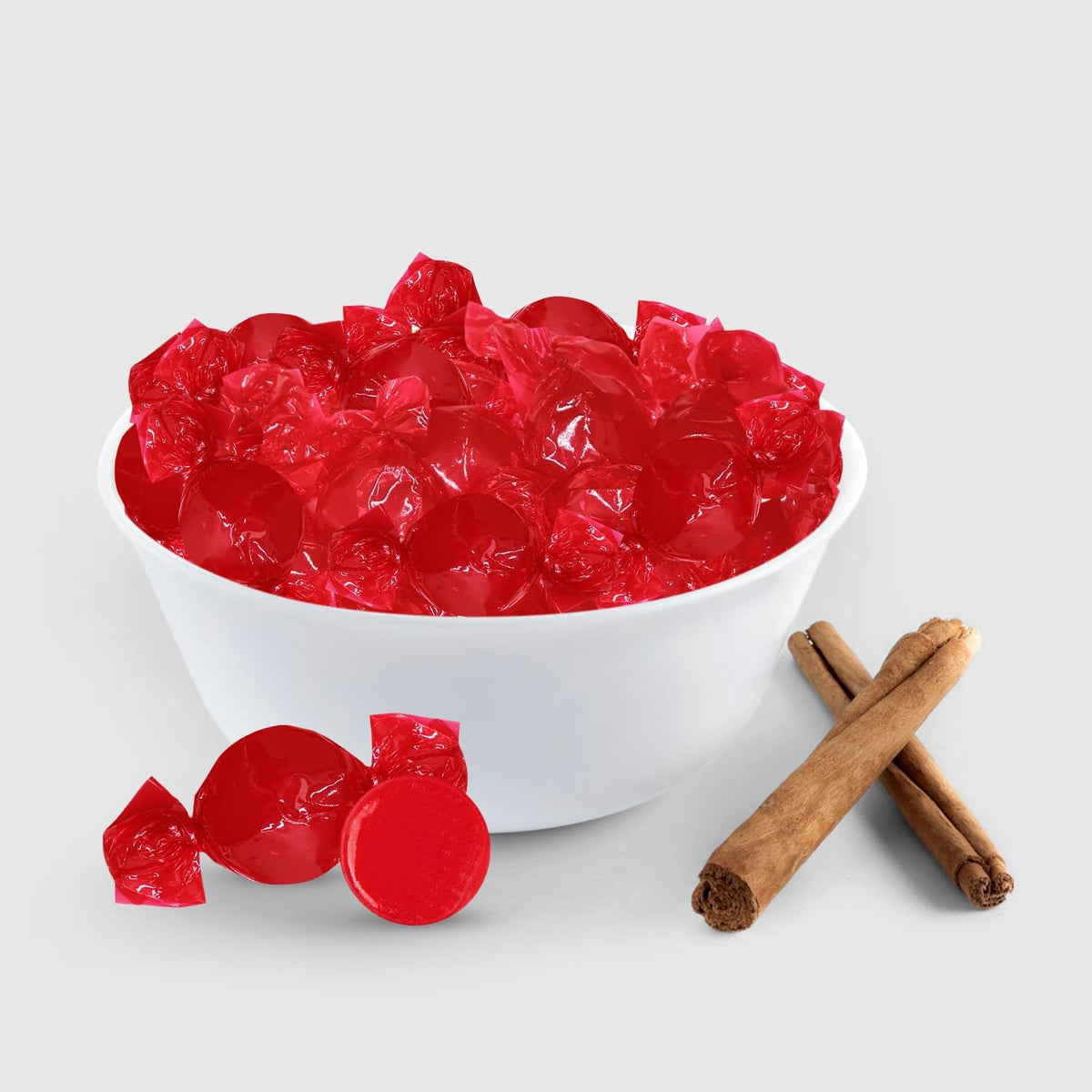 Red cinnamon flavored hard candy discs texture and shape