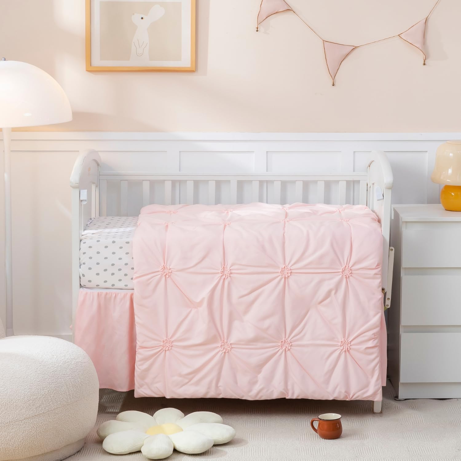 PINNKKU 3-piece crib bedding set front view showcasing pink pintuck pinch pleat blanket and skirt