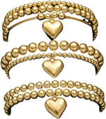 Packaging and overview of the 7-piece adjustable gold beaded jewelry set.
