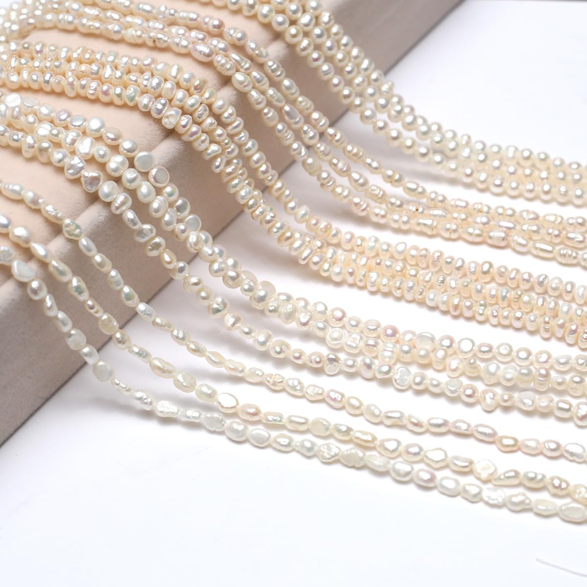 Freshwater pearl loose beads arranged for DIY crafts