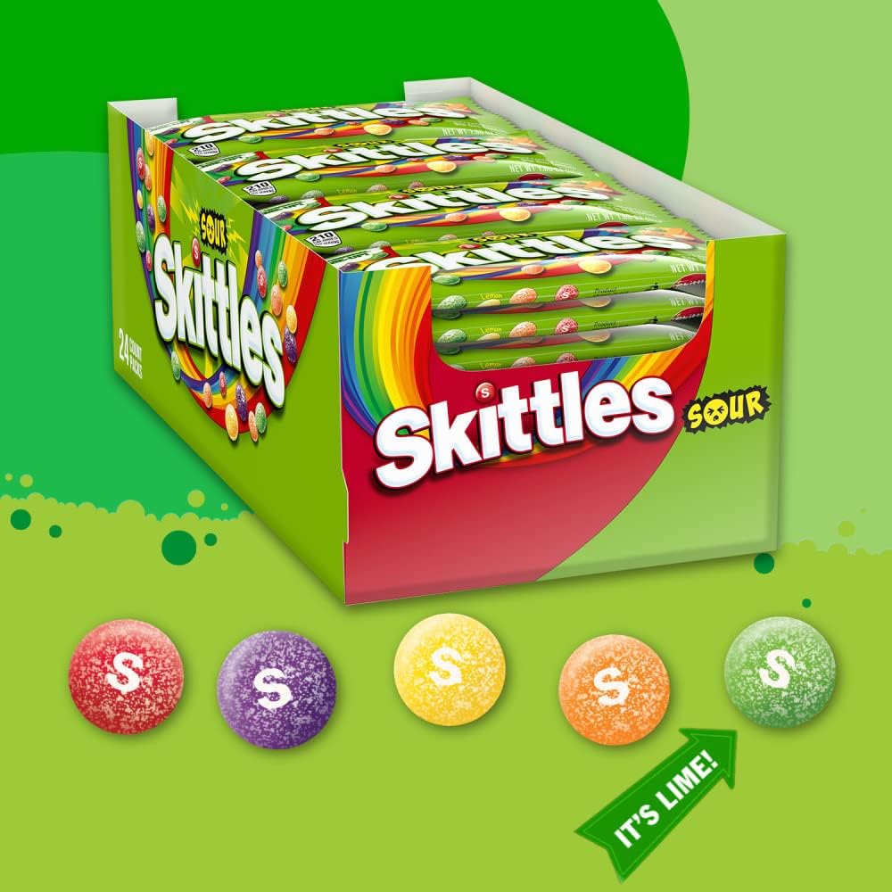 Skittles Sour chewy candy pieces scattered showing the classic sugar shell imprint.