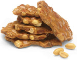 Close up shot of sugar-free buttery nut candy showing crispy texture and roasted peanuts
