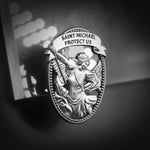 Anwlki Saint Michael car accessory mounted on vehicle sun visor