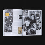 Close up view of historic band member photos inside the book