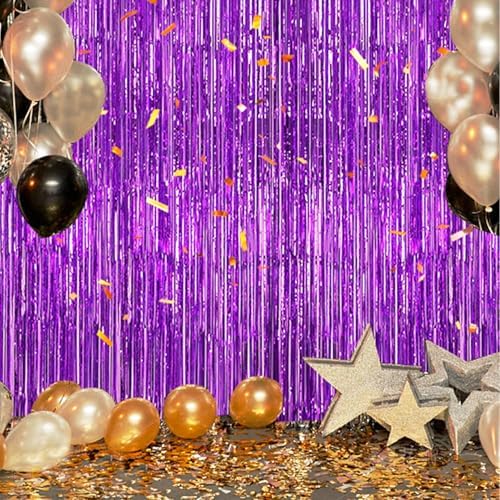 A complete graduation party stage background utilizing the deep purple shimmer fringe backdrops.