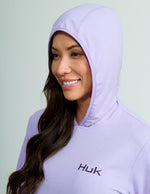 HUK Women's Coldfront+ Pullover Hoodie front pocket feature