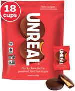 Open grab and go box filled with UNREAL dark chocolate peanut butter pieces