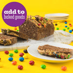 Lifestyle shot showing M&M'S Caramel candies in a home kitchen setting