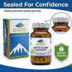 Pure Mountain Botanicals Cat's Claw bottle alongside raw Uncaria tomentosa botanical bark