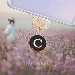 Black initial letter C phone charm pendant detail