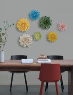 SEINHIJO porcelain floral ornament hanging on a living room wall