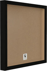 Stupell Industries framed art piece leaned against a kitchen shelf