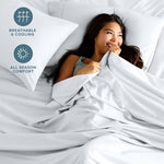 Bare Home white king flat and fitted sheets displayed on a bed frame
