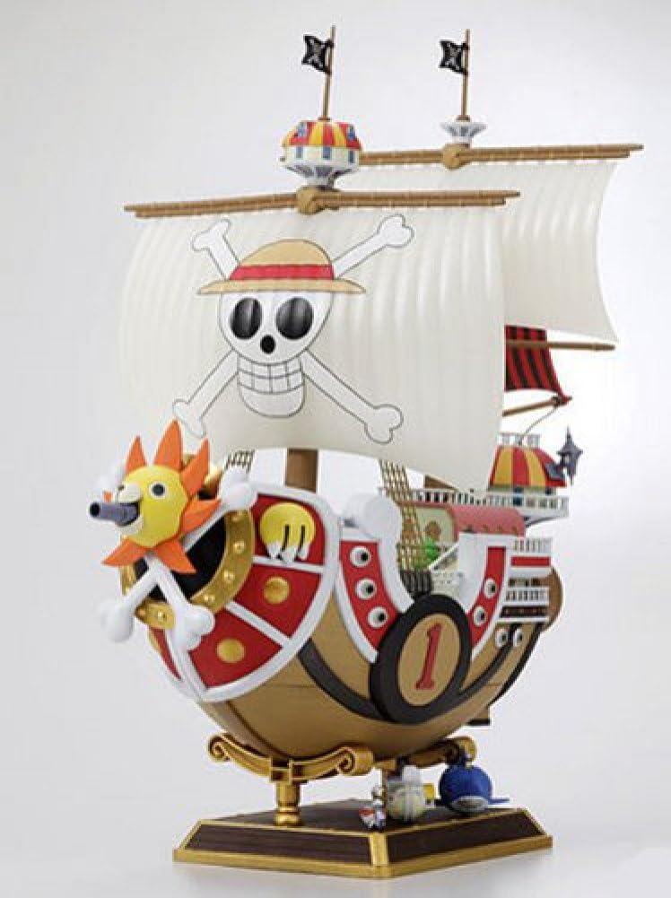 Included miniature crew figures and support ships