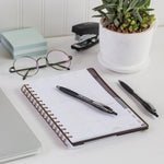 Rubber comfort grip on BIC Glide black retractable ballpoint pen