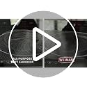Weiman cleaner bottle with scrub pad used on induction stovetop