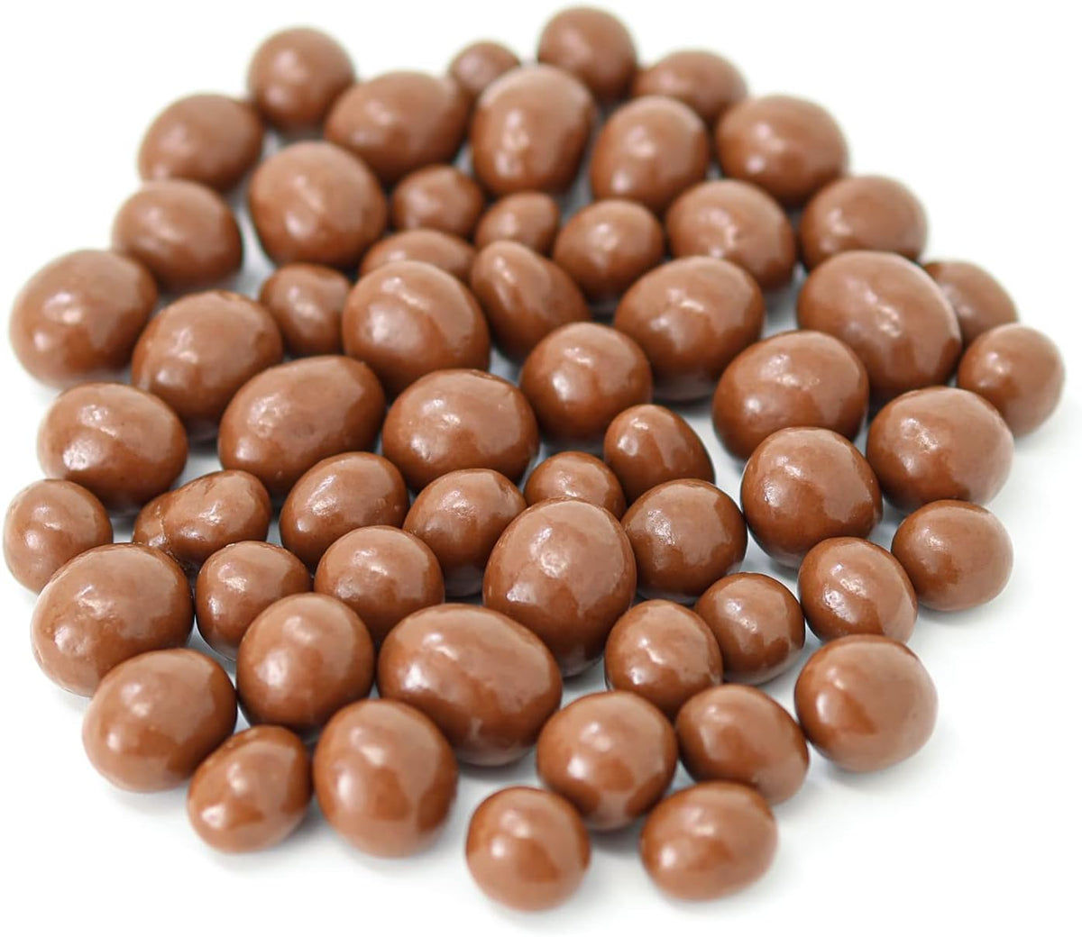 Hand holding a handful of Liberty Bell espresso bean candy