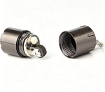 UOOPHEE mini kerosene capsule lighter hanging on a keychain loop comparison