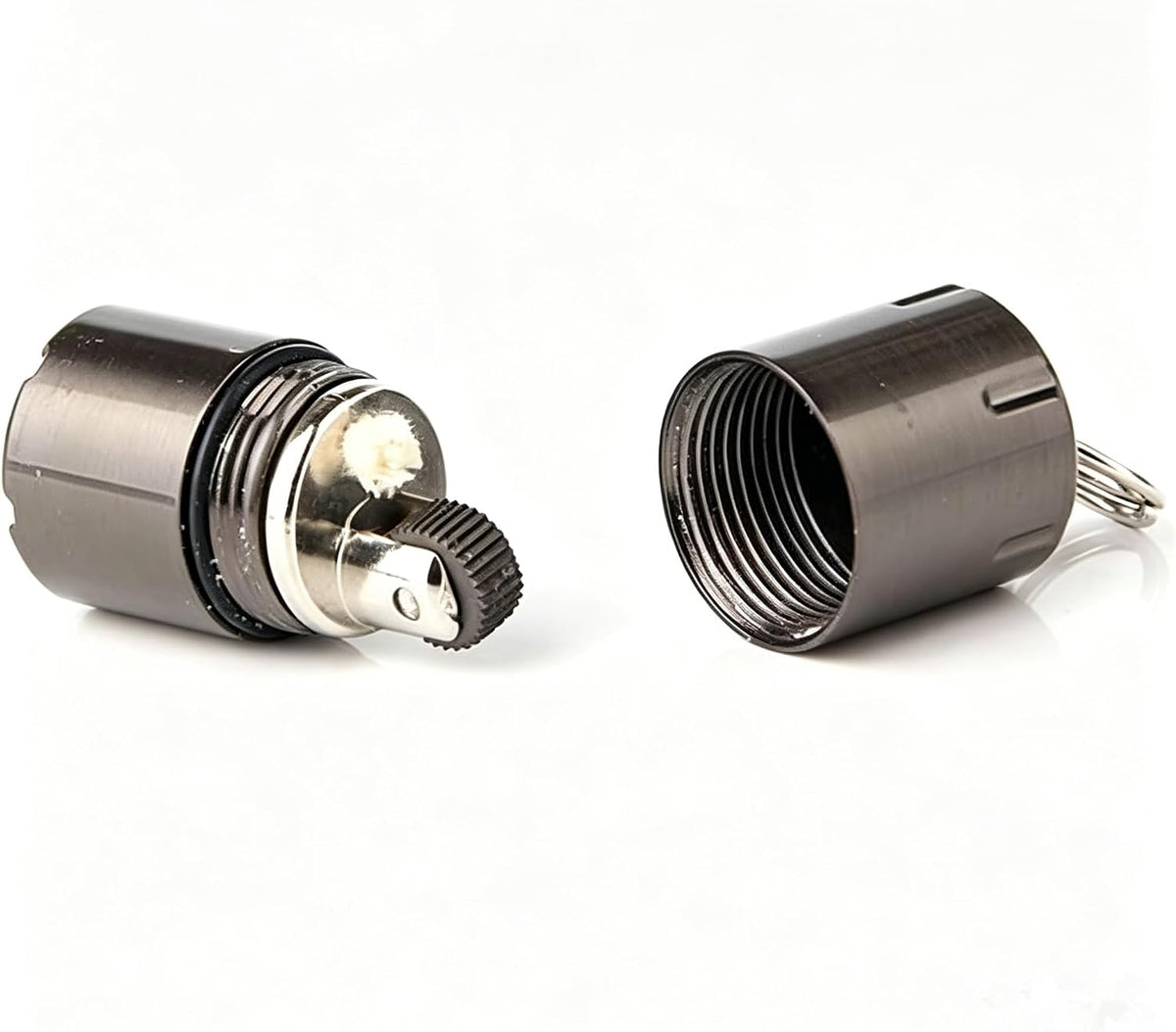 UOOPHEE mini kerosene capsule lighter hanging on a keychain loop comparison