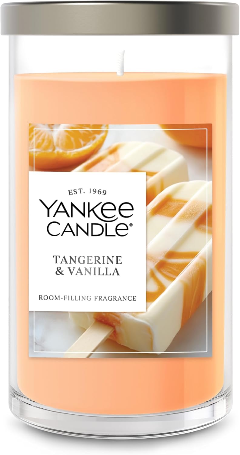 Yankee Candle Tangerine and Vanilla medium pillar candle front view with orange label graphic