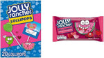 Hand holding a cherry flavor Jolly Rancher filled lollipop ready for snacking