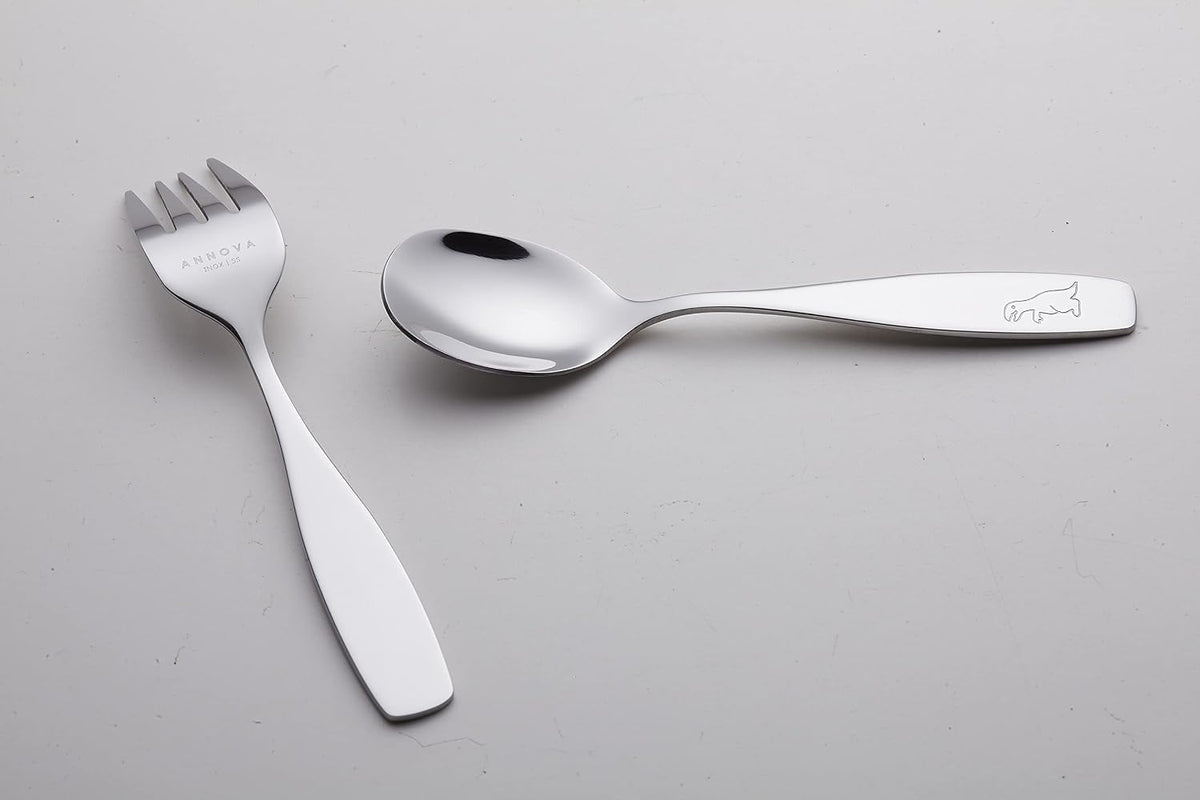 Annova 10-piece kids flatware set displayed with child-friendly tableware items