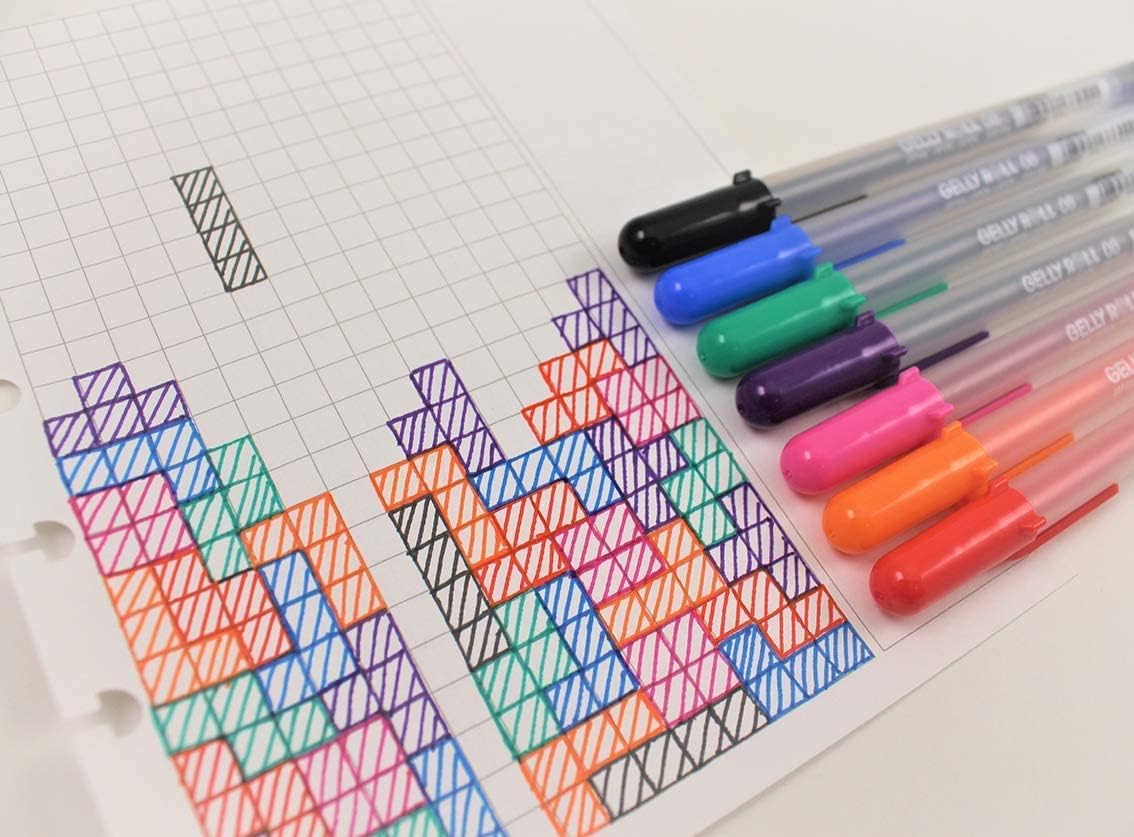 Sakura medium point black pens lifestyle flat lay
