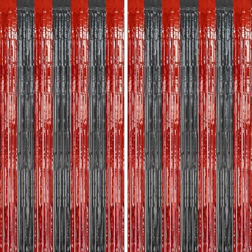 Two packs of DECOCKRAT red and black party streamers installed side by side on a living room wall
