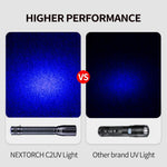 NEXTORCH compact ultraviolet detector flashlight with attached carrying lanyard for portable use.