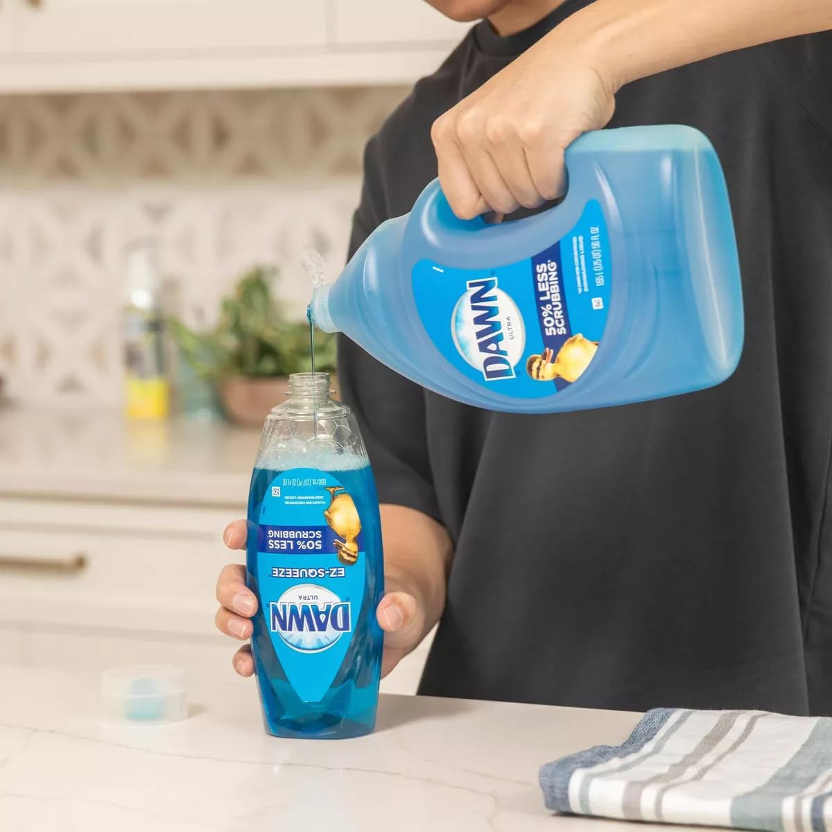 Dawn dishwashing soap bottle sized for kitchen sink convenience
