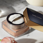 Estee Lauder Double Wear lightweight setting powder puff applicator closeup view.