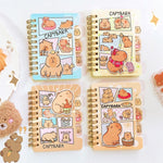 Generic Capybara A7 Mini Notebook front view showcasing cute blue cartoon cover design