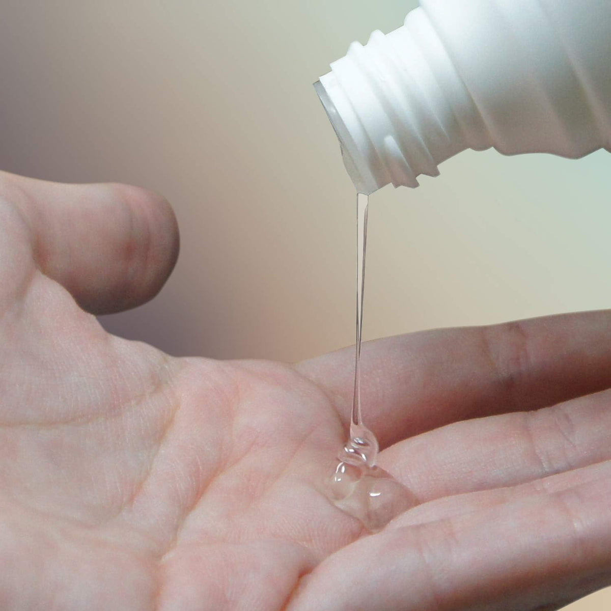 Pjur water based lubricant bottle showing cap and pump mechanism