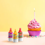 Group of Pelon Pelo Rico mini candy bottles on table