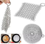 Botefei chainmail scrubber cleaning a cast iron skillet